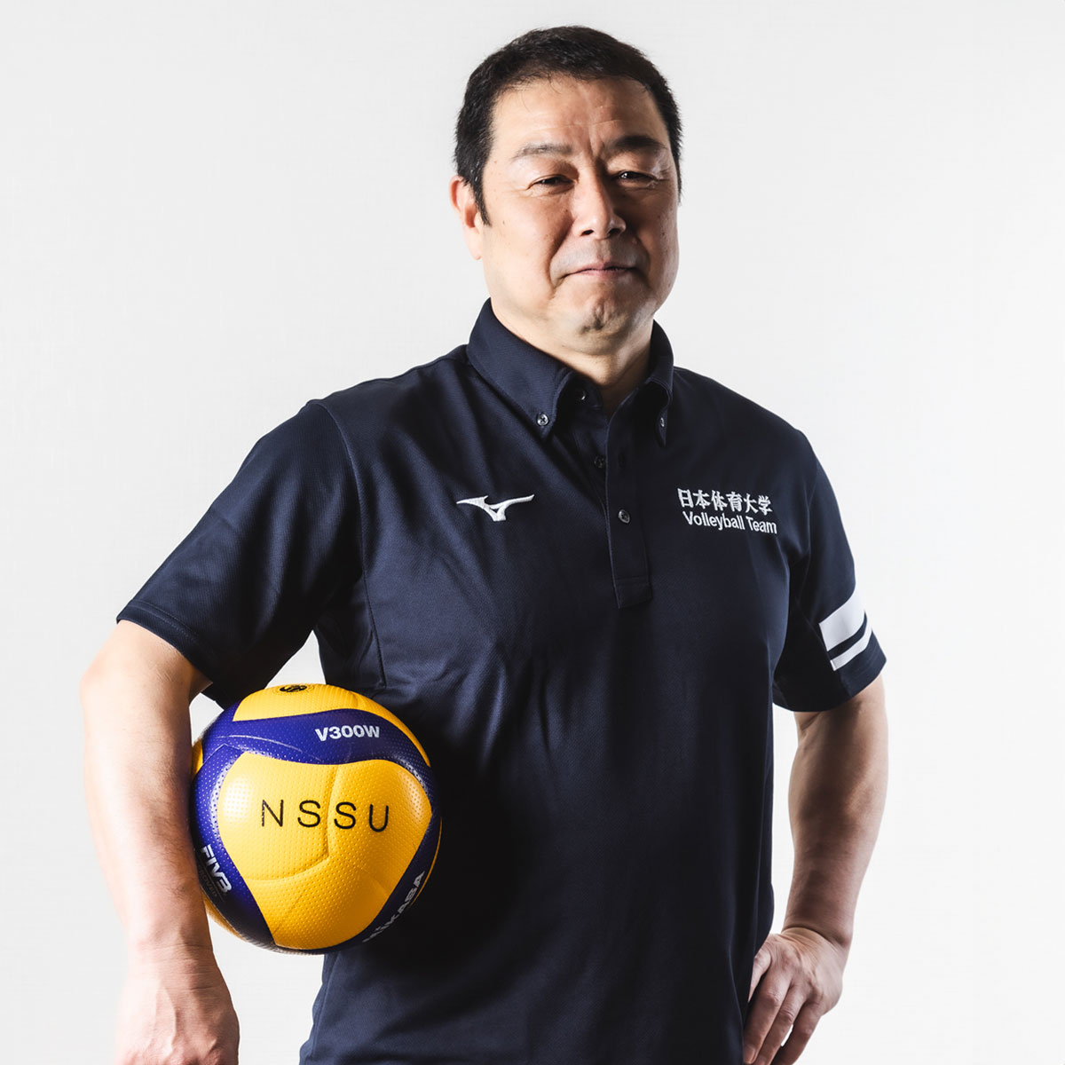 日本体育大学男子バレーボール部　部長 兼 監督山本健之